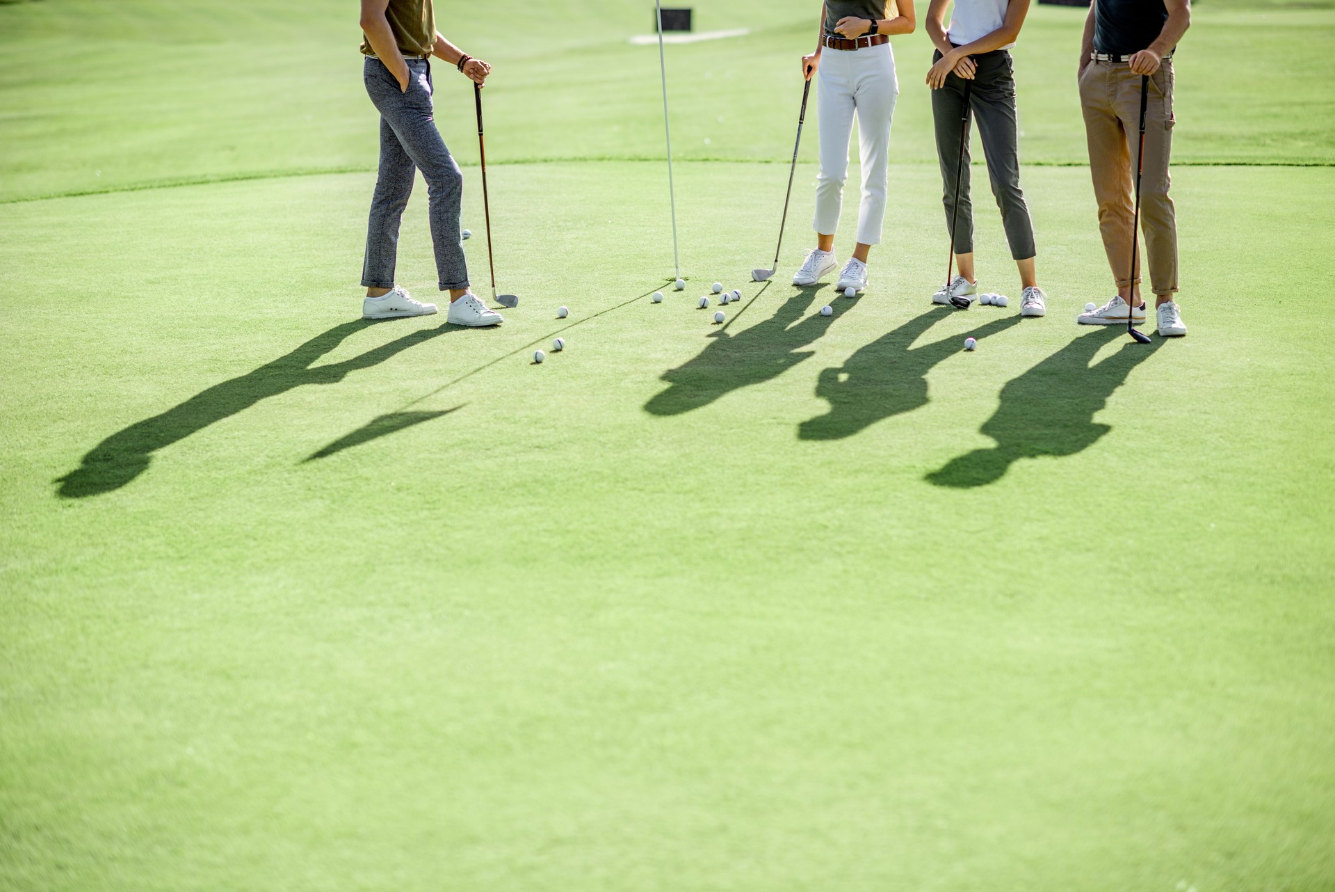People playing on a golf course